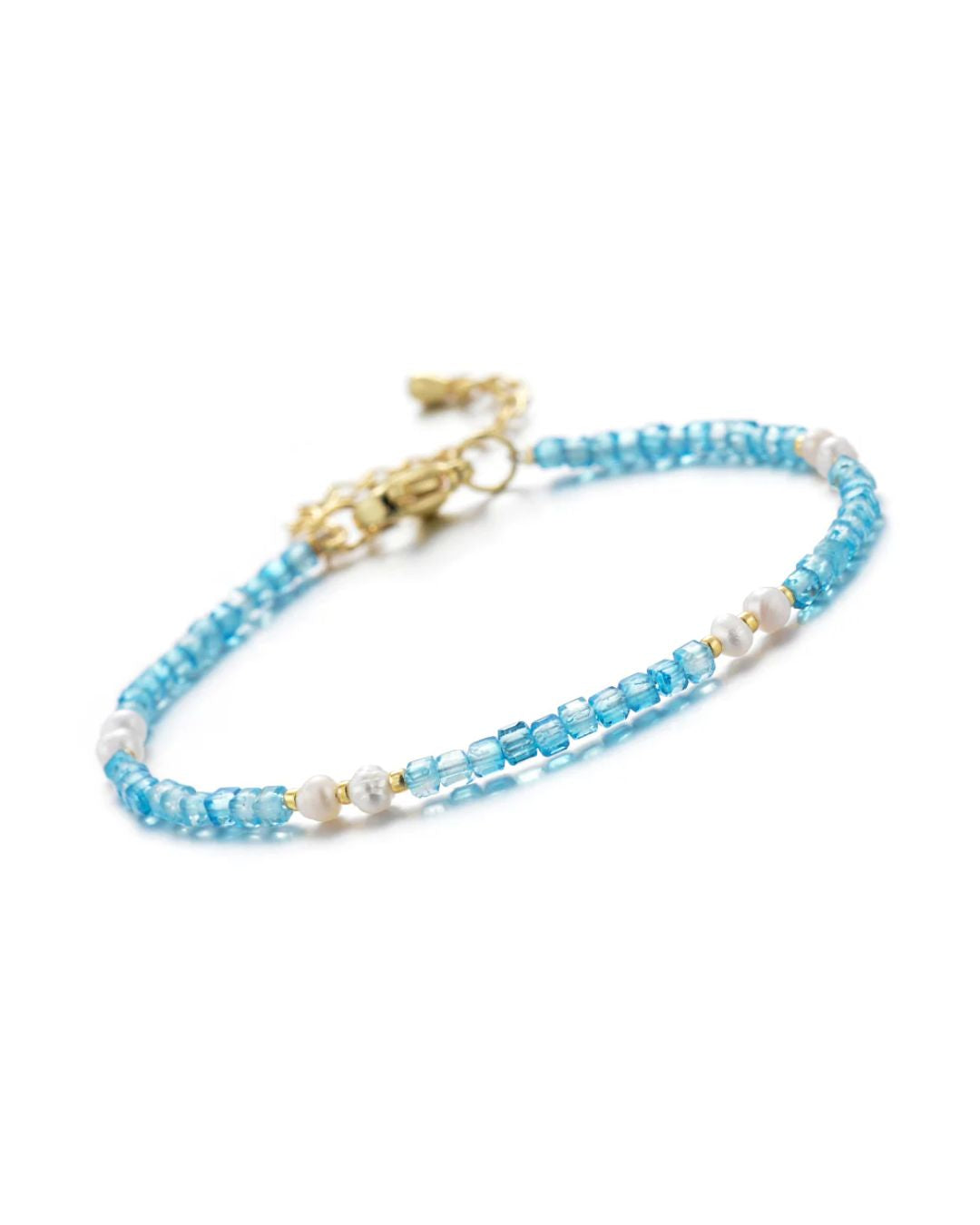 Mira bracelet with clear natural blue topaz beads in pale water blue