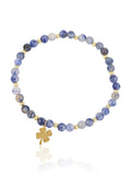 Elara Clover Sodalite bracelet with gold-tone four-leaf clover charm