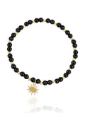 Elara Sun Black Onyx bracelet with gold-tone sun charm